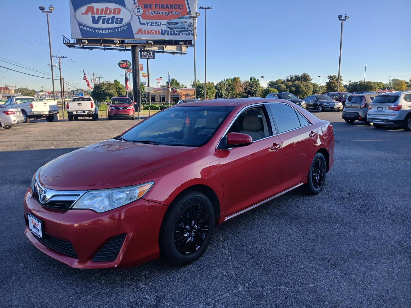 2014 RED Toyota Camry L (4T4BF1FK8ER) with an 2.5L L4 DOHC 16V engine, 6-Speed Automatic transmission, located at 8640 E R L Thornton Fwy, Dallas, TX, 75228, (469) 297-4144, 32.794128, -96.693008 - Photo#0