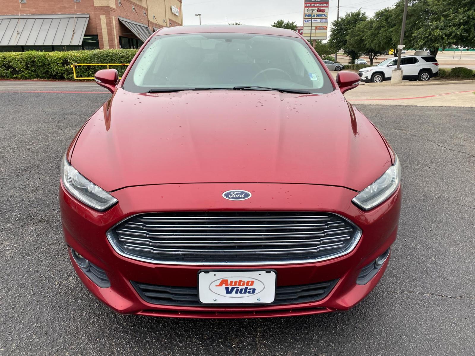 2013 RED Ford Fusion SE (3FA6P0HRXDR) with an 1.6L L4 DOHC 16V engine, located at 420 I-35E, Lancaster, TX, 75146, (469) 297-4144, 32.593929, -96.823685 - Photo #0