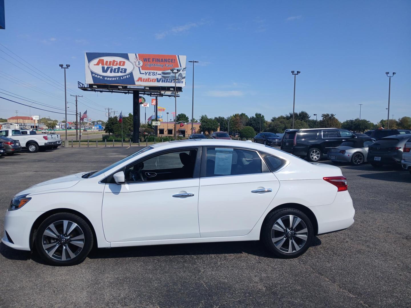 2019 WHITE Nissan Sentra S CVT (3N1AB7AP5KY) with an 1.8L L4 SFI DOHC 16V engine, CVT transmission, located at 420 I-35E, Lancaster, TX, 75146, (469) 297-4144, 32.593929, -96.823685 - Photo#1