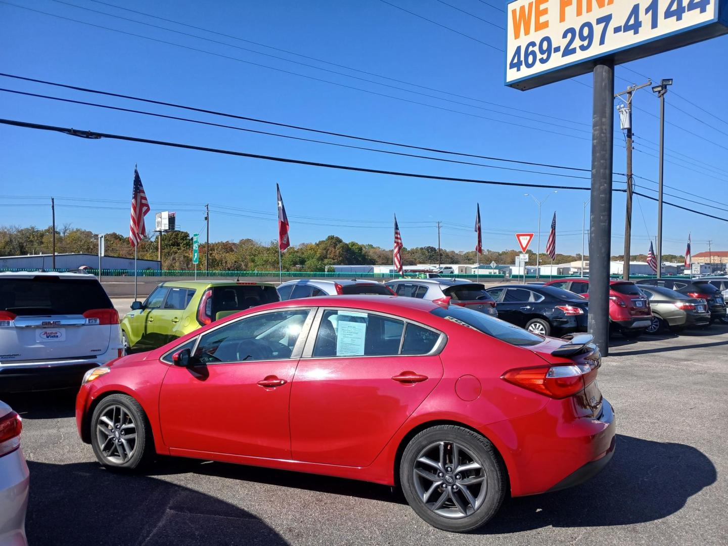 2016 RED Kia Forte LX w/Popular Package (KNAFK4A62G5) with an 1.8L L4 DOHC 16V engine, located at 420 I-35E, Lancaster, TX, 75146, (469) 297-4144, 32.593929, -96.823685 - Photo#1