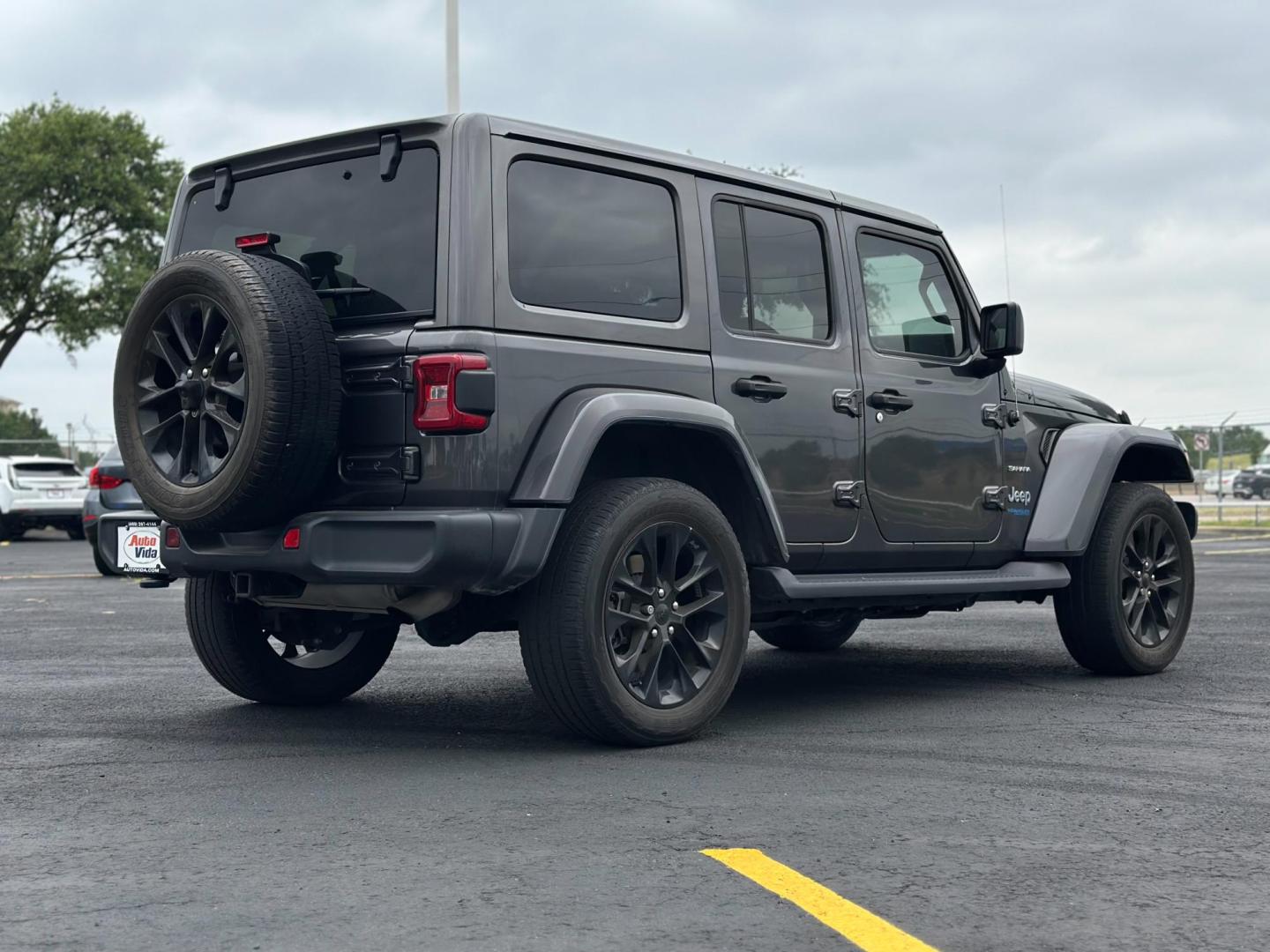 2021 GRAY Jeep Wrangler Unlimited Sahara 4XE (1C4JJXP60MW) with an 2.0L L4 DOHC 16V HYBRID engine, 8A transmission, located at 8640 E R L Thornton Fwy, Dallas, TX, 75228, (469) 297-4144, 32.794128, -96.693008 - Photo#4