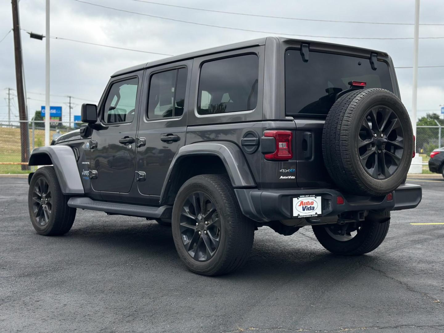 2021 GRAY Jeep Wrangler Unlimited Sahara 4XE (1C4JJXP60MW) with an 2.0L L4 DOHC 16V HYBRID engine, 8A transmission, located at 8640 E R L Thornton Fwy, Dallas, TX, 75228, (469) 297-4144, 32.794128, -96.693008 - Photo#5