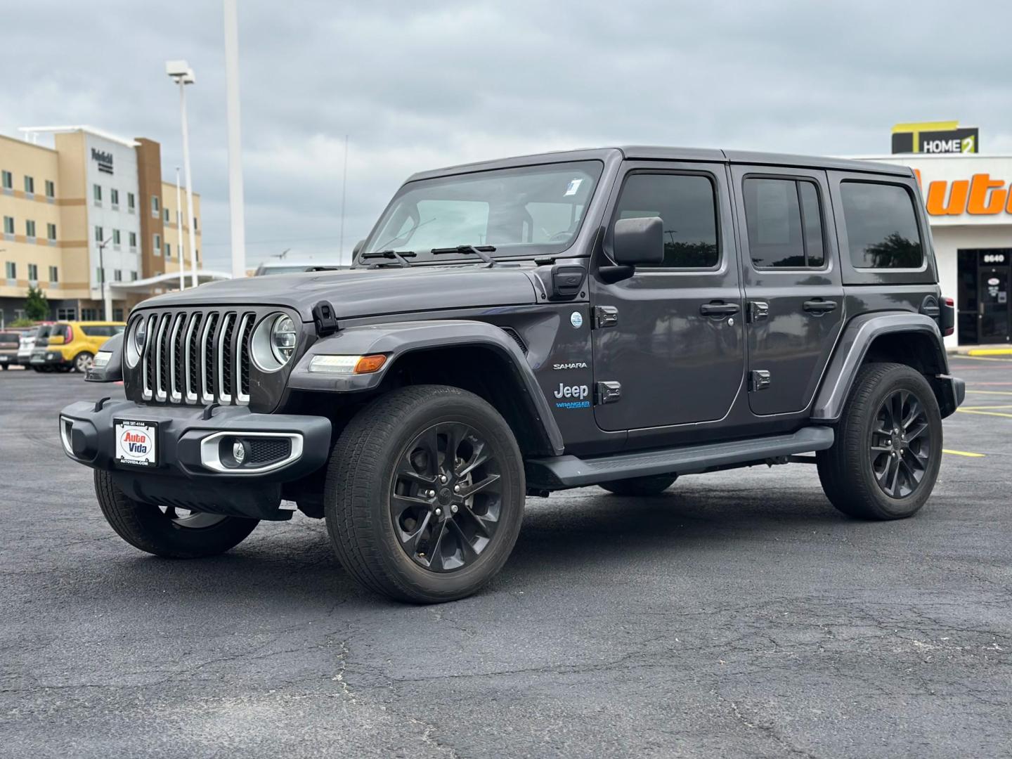 2021 GRAY Jeep Wrangler Unlimited Sahara 4XE (1C4JJXP60MW) with an 2.0L L4 DOHC 16V HYBRID engine, 8A transmission, located at 8640 E R L Thornton Fwy, Dallas, TX, 75228, (469) 297-4144, 32.794128, -96.693008 - Photo#7