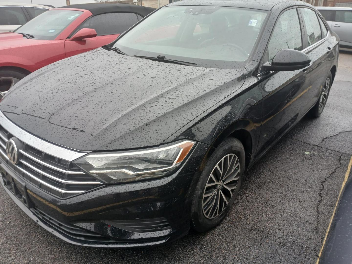 2019 BLACK Volkswagen Jetta 1.4T SE 8A (3VWC57BUXKM) with an 1.4L L4 DOHC 20V engine, 8A transmission, located at 8640 E R L Thornton Fwy, Dallas, TX, 75228, (469) 297-4144, 32.794128, -96.693008 - Photo#2