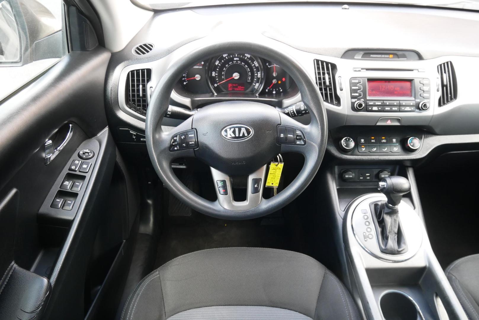 2015 BROWN Kia Sportage LX FWD (KNDPB3AC4F7) with an 2.4L V6 DOHC 24V engine, 6-Speed Automatic transmission, located at 8640 E R L Thornton Fwy, Dallas, TX, 75228, (469) 297-4144, 32.794128, -96.693008 - Photo#13