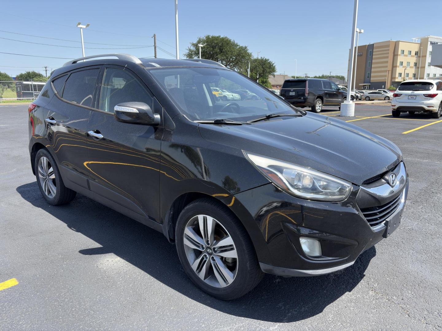 2015 BLACK Hyundai Tucson GLS 2WD (KM8JU3AG3FU) with an 2.4L L4 DOHC 16V engine, 6-Speed Automatic transmission, located at 8640 E R L Thornton Fwy, Dallas, TX, 75228, (469) 297-4144, 32.794128, -96.693008 - Photo#2