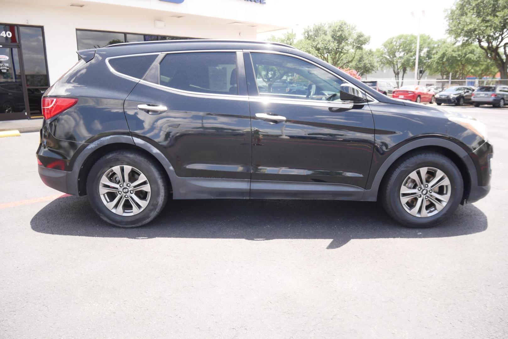2016 BLACK Hyundai Santa Fe Sport 2.4 FWD (5XYZU3LB8GG) with an 2.4L L4 DOHC 16V engine, 6-Speed Automatic transmission, located at 8640 E R L Thornton Fwy, Dallas, TX, 75228, (469) 297-4144, 32.794128, -96.693008 - Photo#1