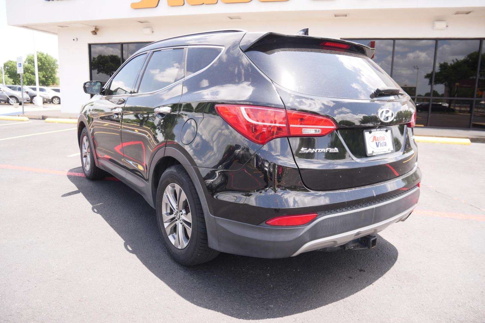 2016 BLACK Hyundai Santa Fe Sport 2.4 FWD (5XYZU3LB8GG) with an 2.4L L4 DOHC 16V engine, 6-Speed Automatic transmission, located at 8640 E R L Thornton Fwy, Dallas, TX, 75228, (469) 297-4144, 32.794128, -96.693008 - Photo#4