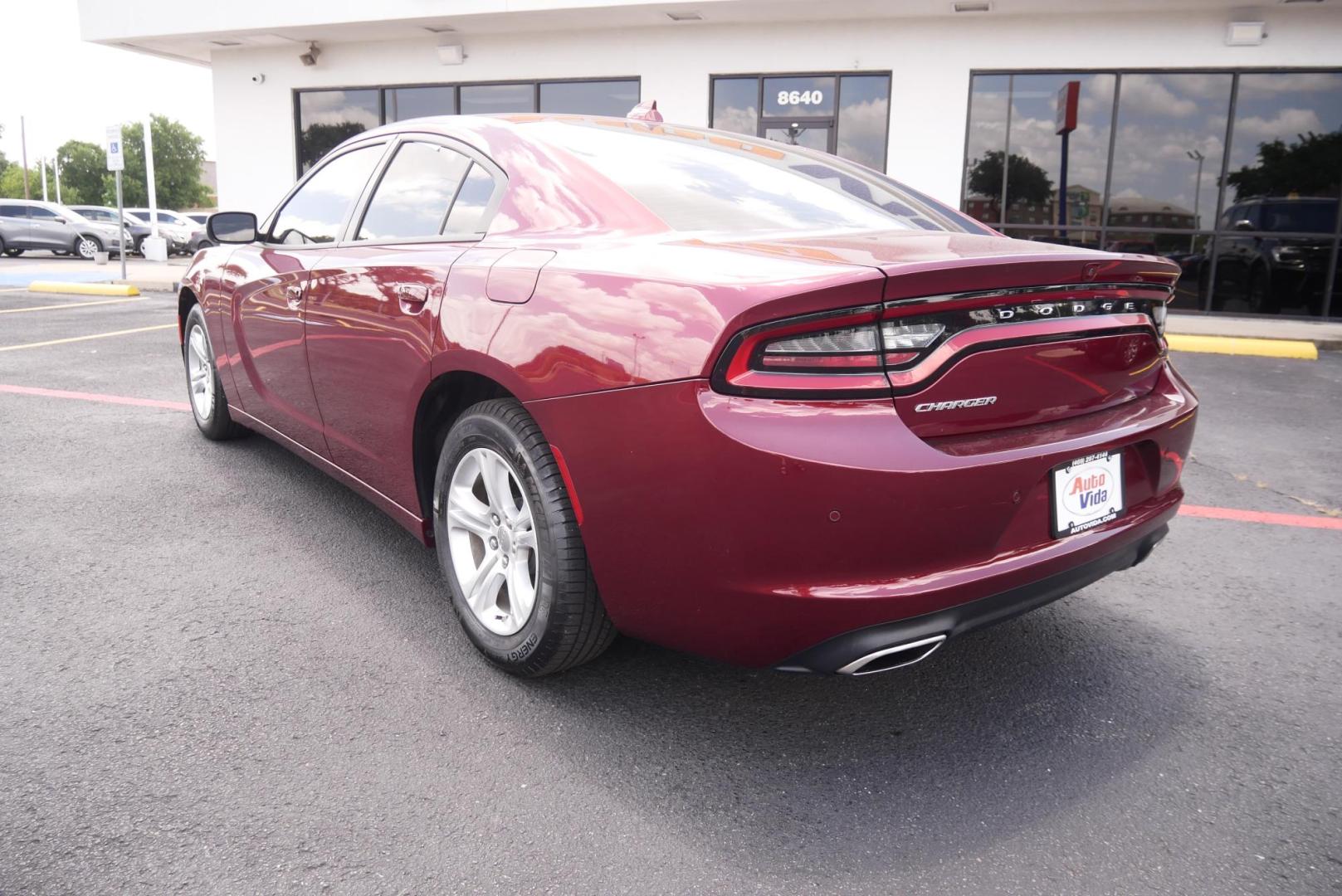 2023 RED Dodge Charger SXT (2C3CDXBG7PH) with an 3.6L V6 DOHC 24V engine, 8A transmission, located at 8640 E R L Thornton Fwy, Dallas, TX, 75228, (469) 297-4144, 32.794128, -96.693008 - Photo#4