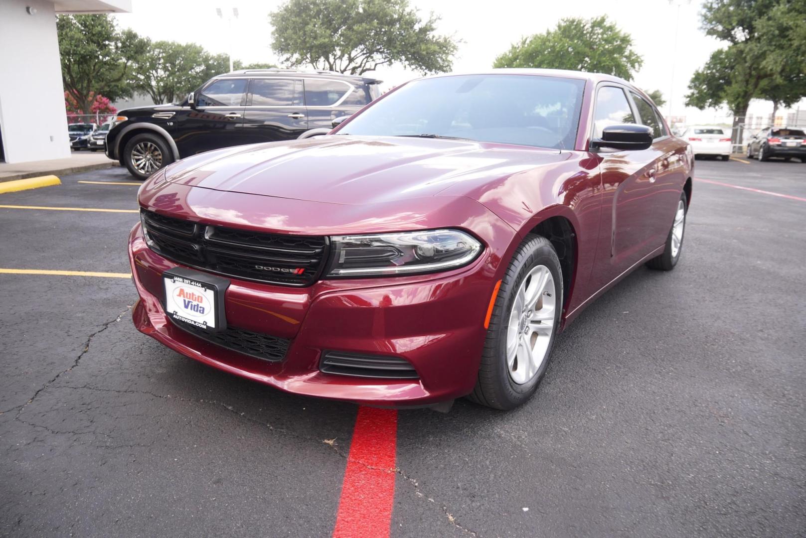 2023 RED Dodge Charger SXT (2C3CDXBG7PH) with an 3.6L V6 DOHC 24V engine, 8A transmission, located at 8640 E R L Thornton Fwy, Dallas, TX, 75228, (469) 297-4144, 32.794128, -96.693008 - Photo#6
