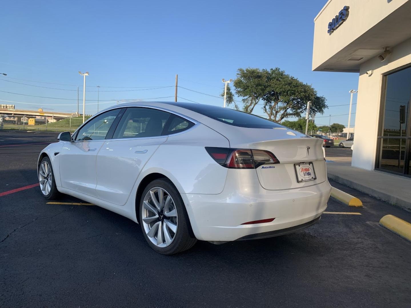 2019 WHITE Tesla Model 3 Base (5YJ3E1EA4KF) with an ELECTRIC engine, 1A transmission, located at 8640 E R L Thornton Fwy, Dallas, TX, 75228, (469) 297-4144, 32.794128, -96.693008 - Photo#2