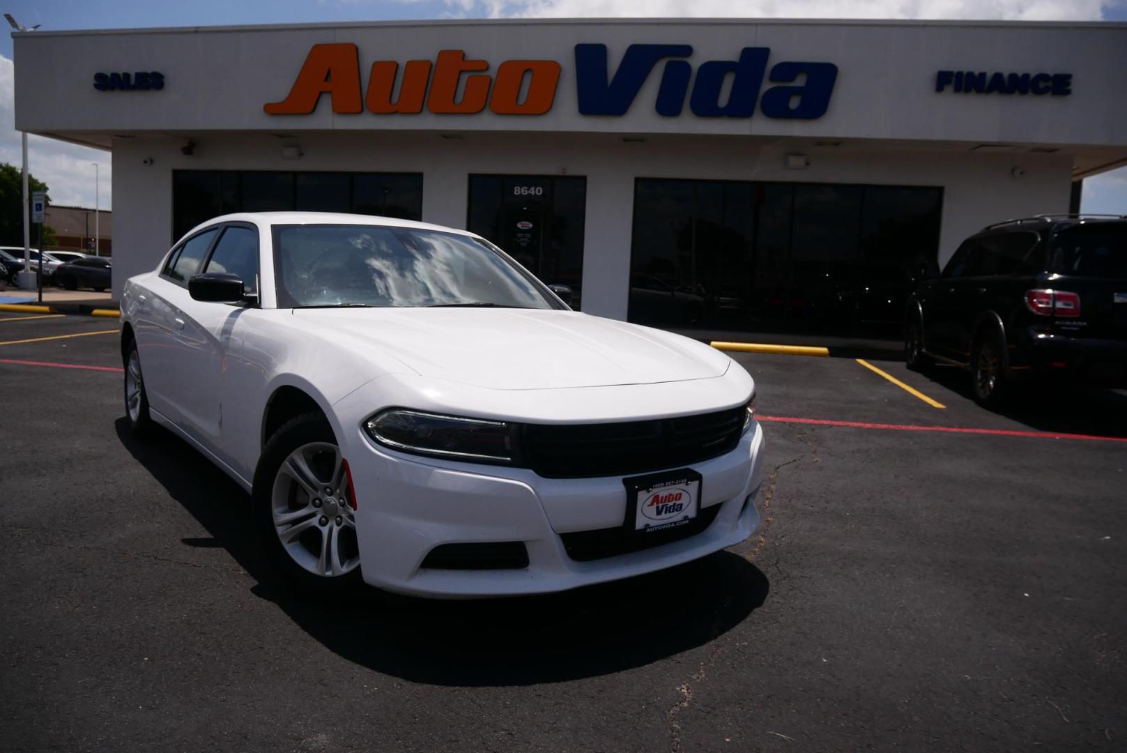 2023 WHITE Dodge Charger SXT (2C3CDXBG0PH) with an 3.6L V6 DOHC 24V engine, 8A transmission, located at 8640 E R L Thornton Fwy, Dallas, TX, 75228, (469) 297-4144, 32.794128, -96.693008 - Photo#0
