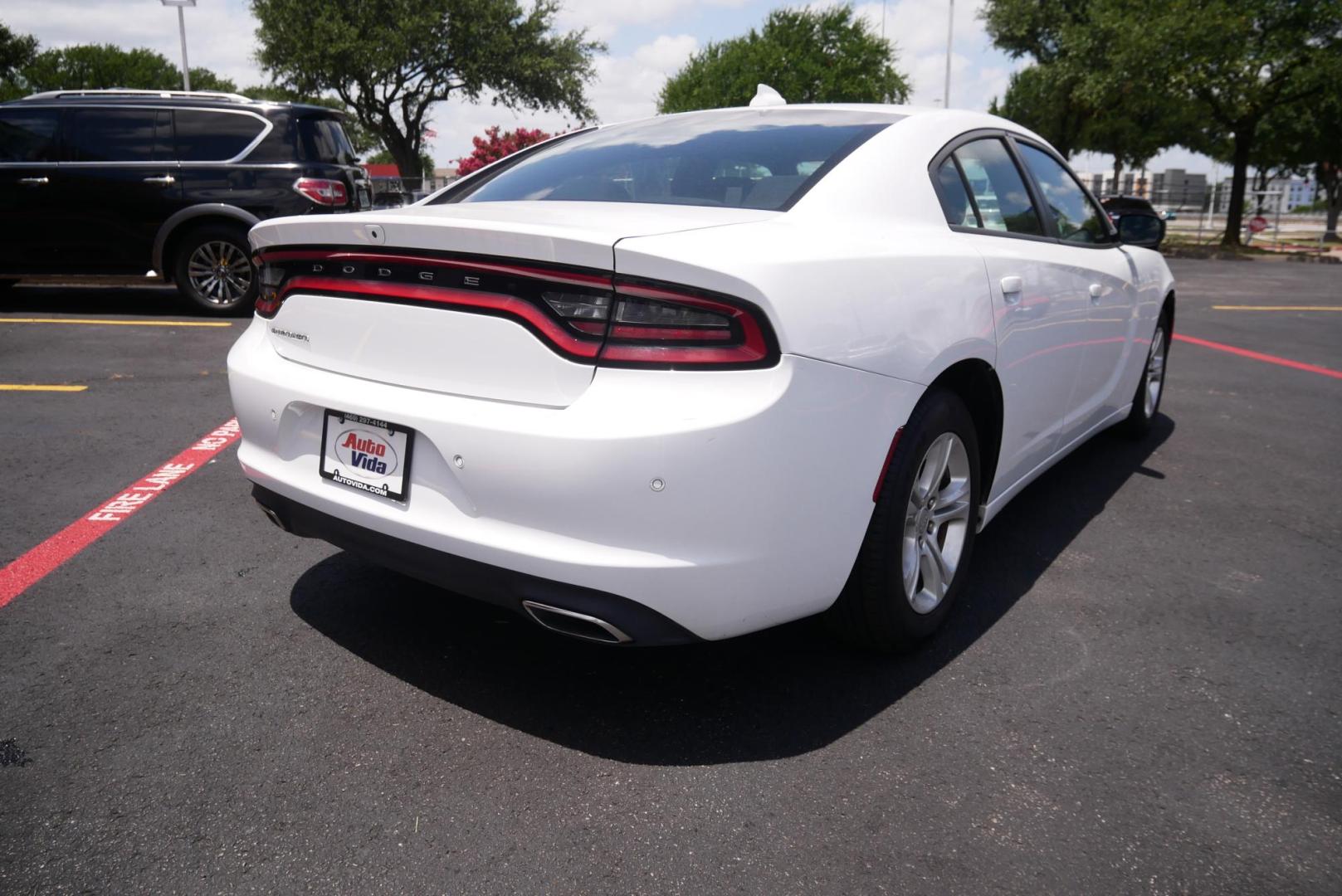 2023 WHITE Dodge Charger SXT (2C3CDXBG0PH) with an 3.6L V6 DOHC 24V engine, 8A transmission, located at 8640 E R L Thornton Fwy, Dallas, TX, 75228, (469) 297-4144, 32.794128, -96.693008 - Photo#2