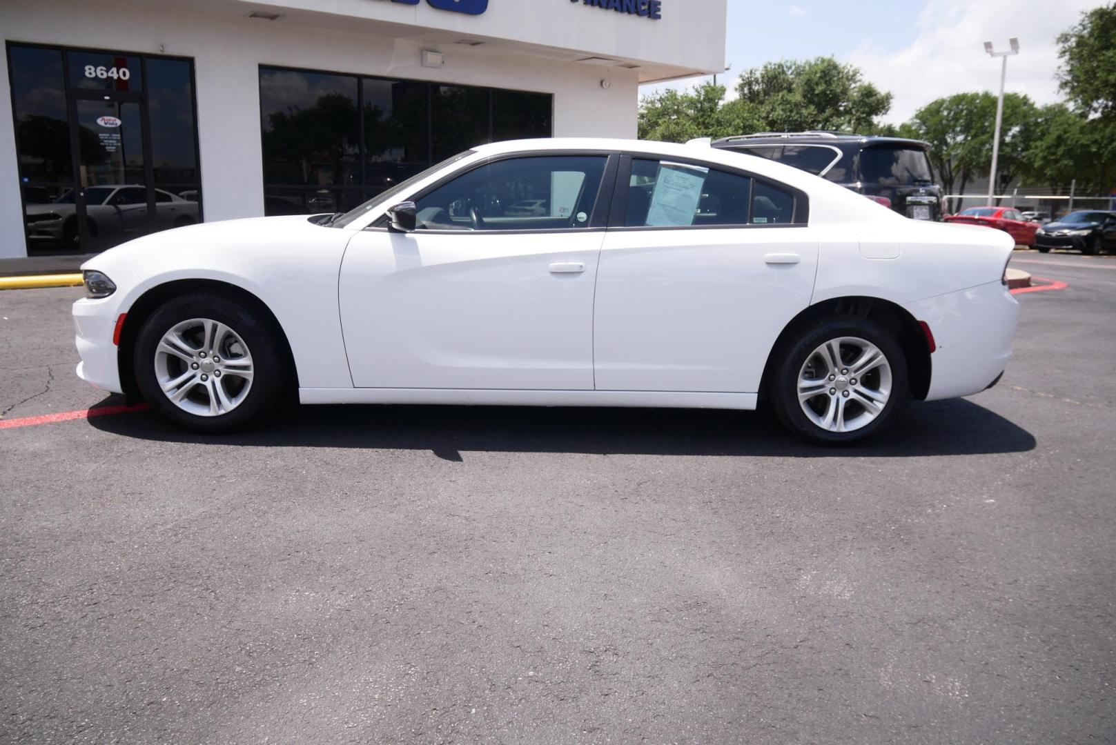 2023 WHITE Dodge Charger SXT (2C3CDXBG0PH) with an 3.6L V6 DOHC 24V engine, 8A transmission, located at 8640 E R L Thornton Fwy, Dallas, TX, 75228, (469) 297-4144, 32.794128, -96.693008 - Photo#5