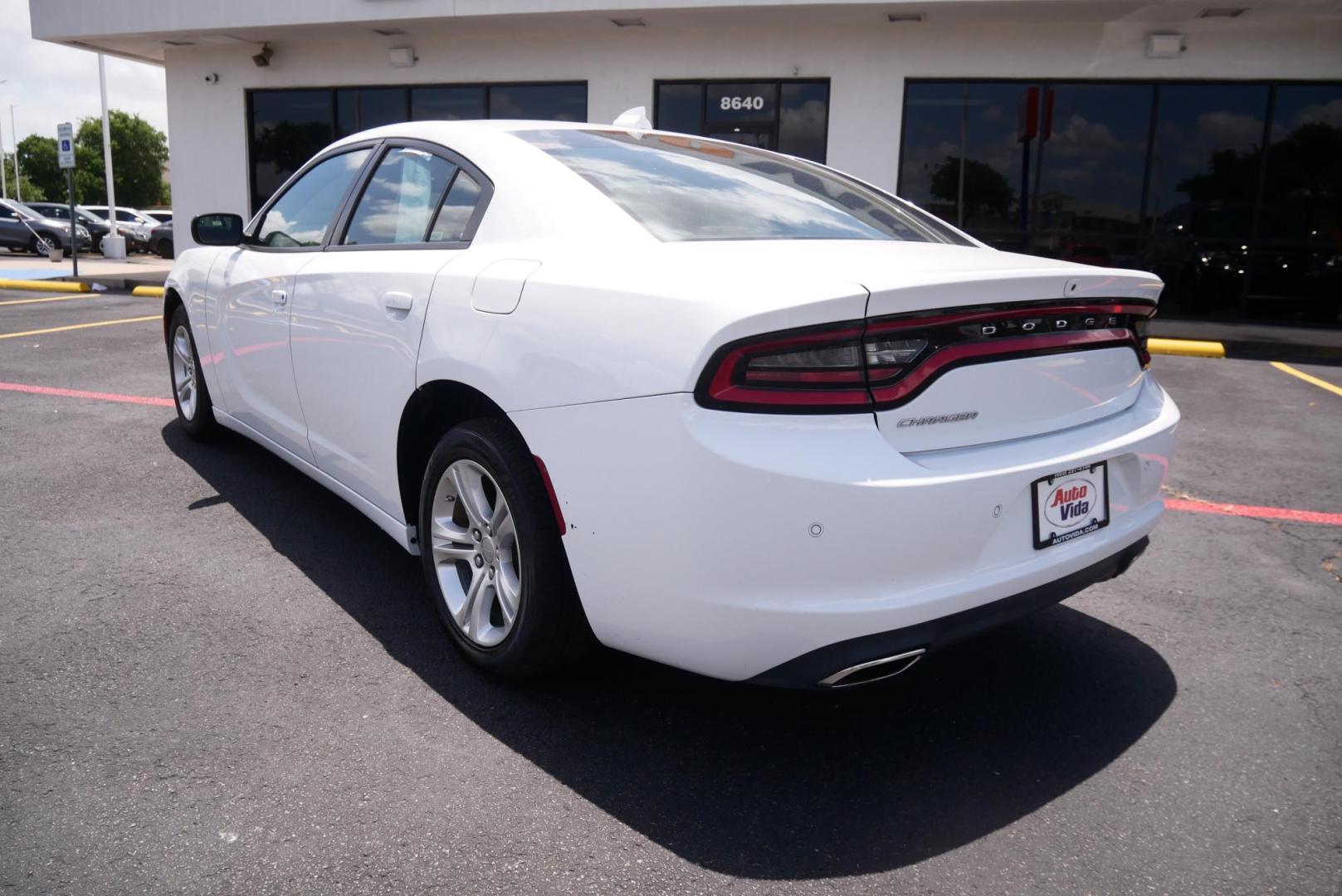 2023 WHITE Dodge Charger SXT (2C3CDXBG0PH) with an 3.6L V6 DOHC 24V engine, 8A transmission, located at 8640 E R L Thornton Fwy, Dallas, TX, 75228, (469) 297-4144, 32.794128, -96.693008 - Photo#4